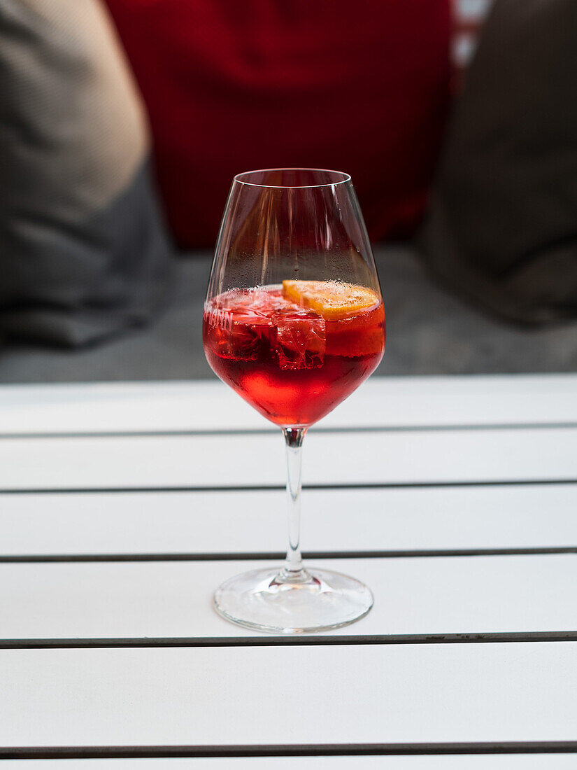 Non-alcoholic cranberry cocktail with ice cubes