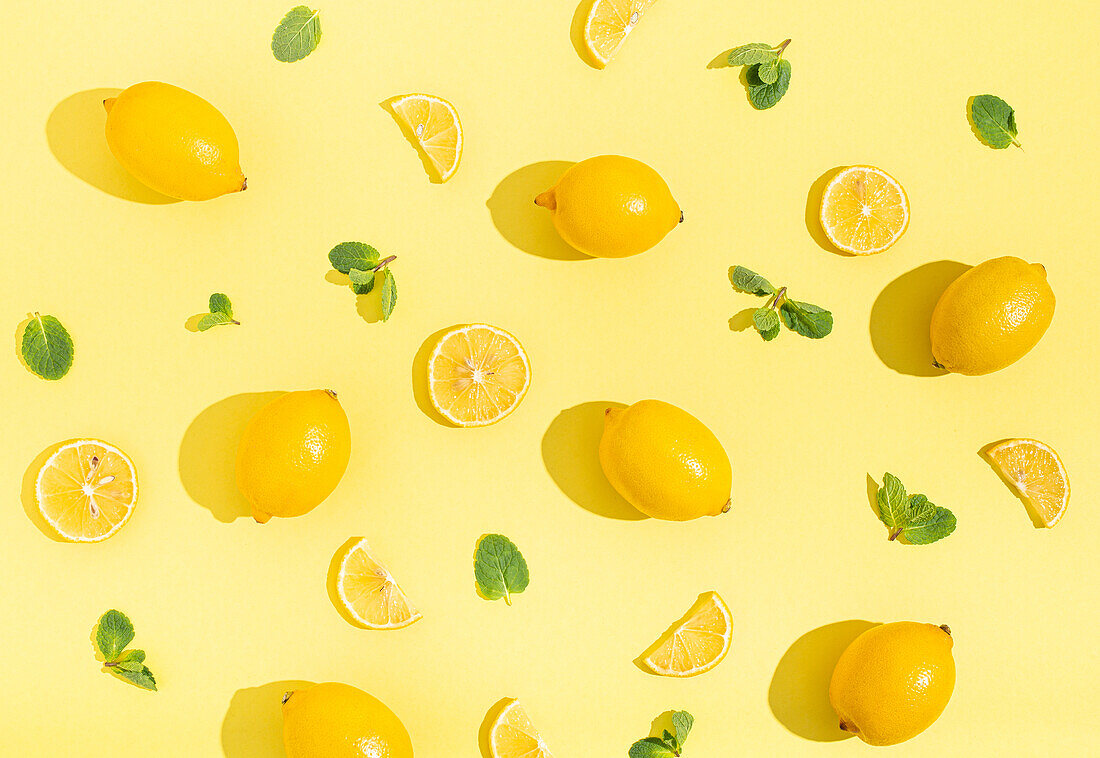 Fresh yellow lemons with mint