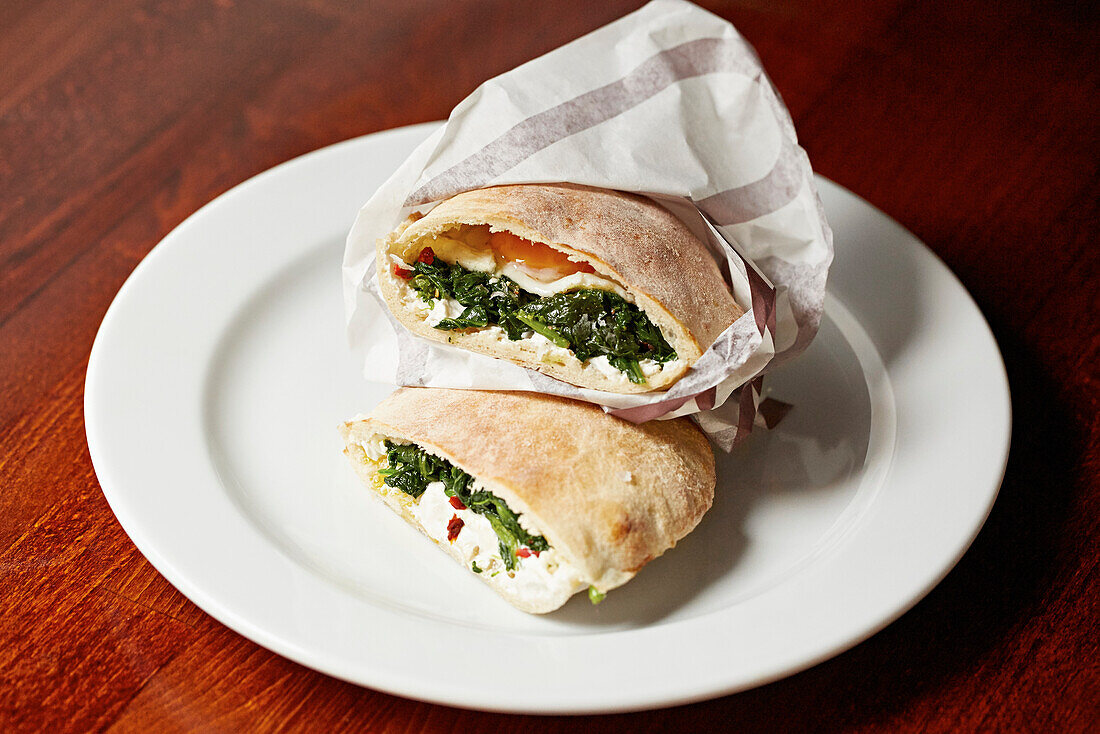 Stuffed flat breads, with egg, spinach, ricotta and chilli