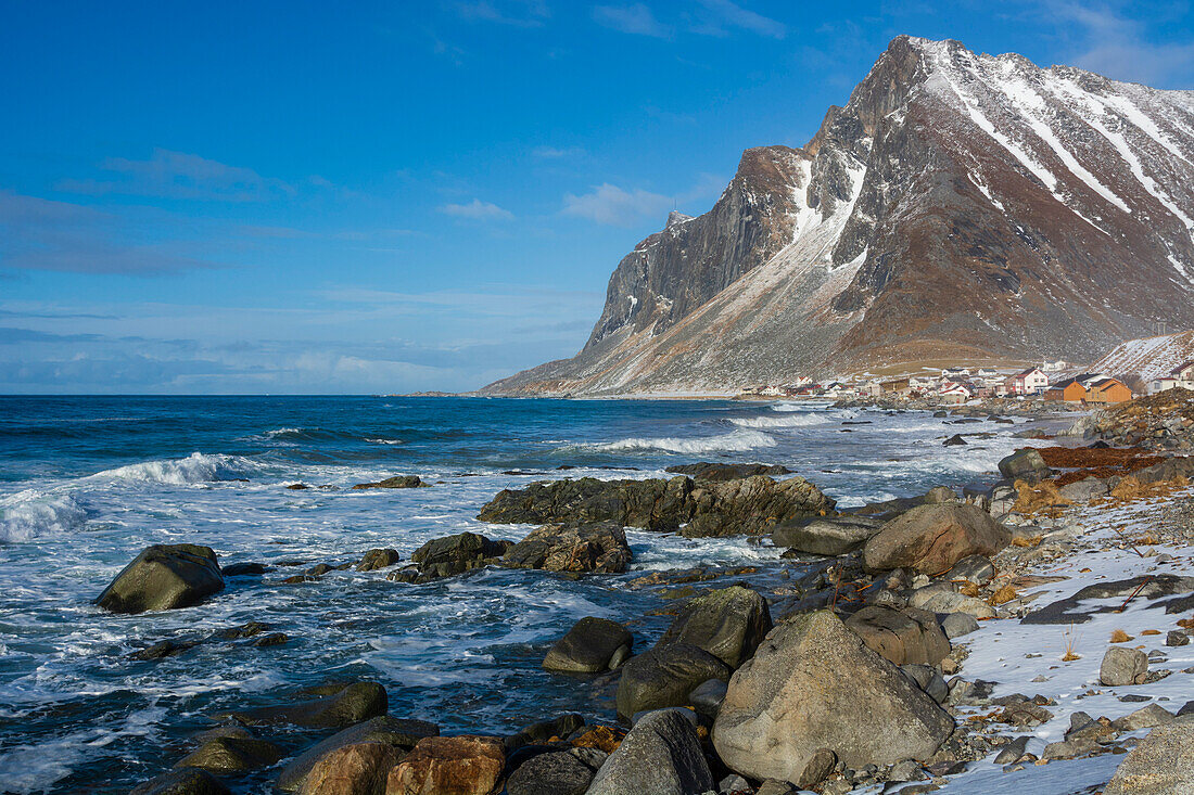 View of a village and rocky coastline, Nordland, Norway
