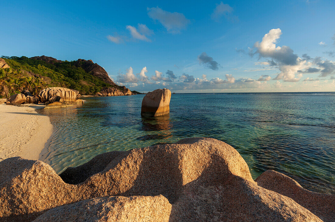 Rock formations and sandy beach on a tropical beach