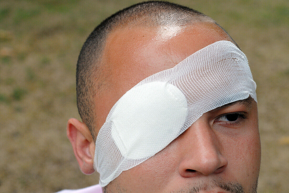 Man wearing any eye patch