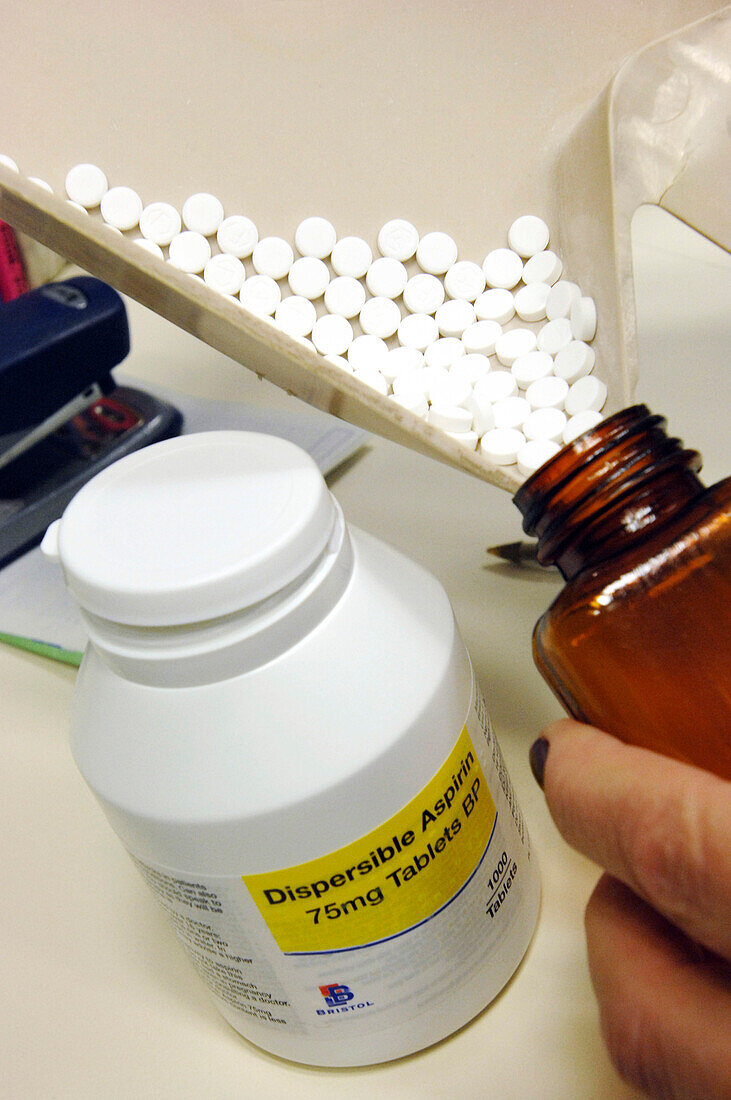 Pharmacist dispensing tablets