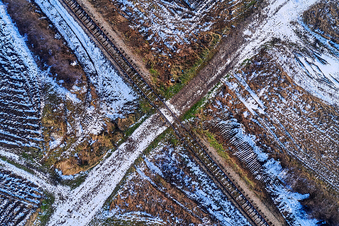 Railway tracks in winter, aerial view