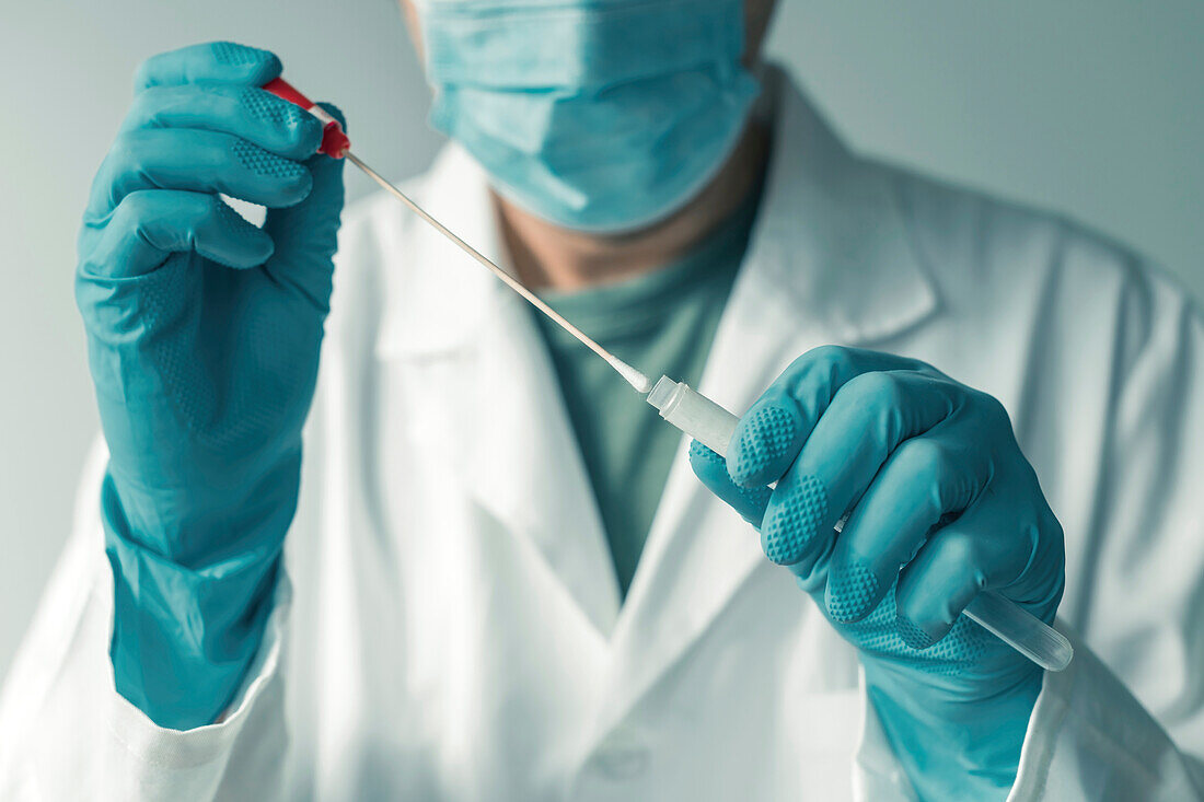Doctor with sample swab