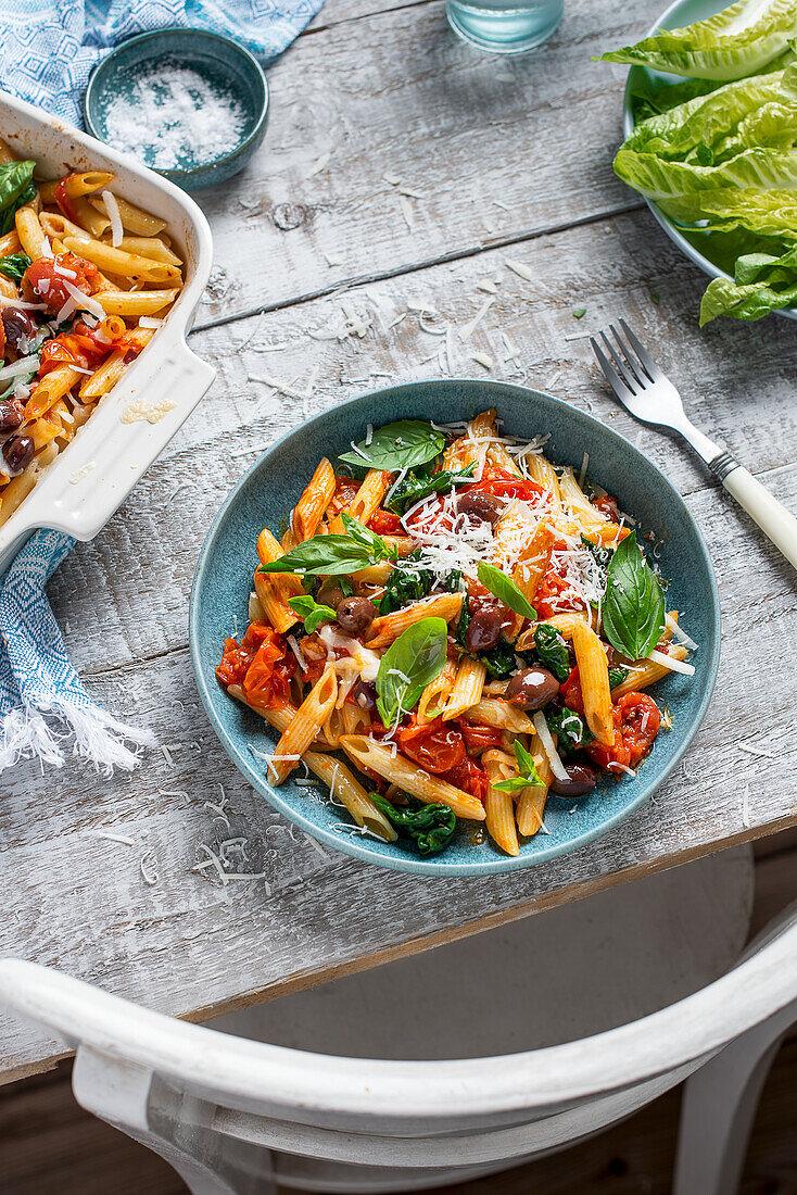 Penne with roasted tomato Arrabbiata sauce, Grana padano cheese and olives