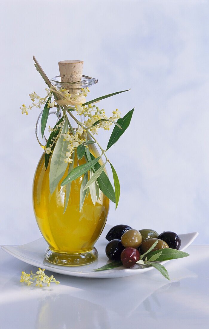 Olive oil, olive flowers. and oil cured olives