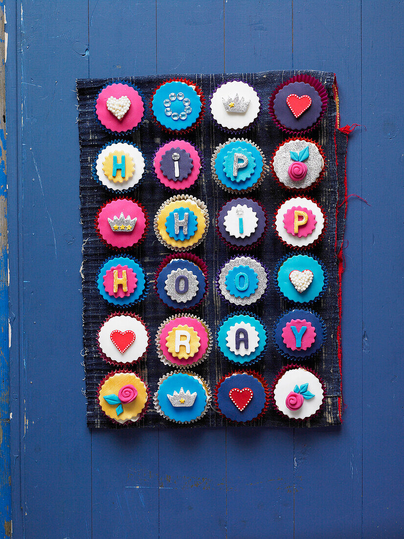 Festive cupcakes colourfully decorated