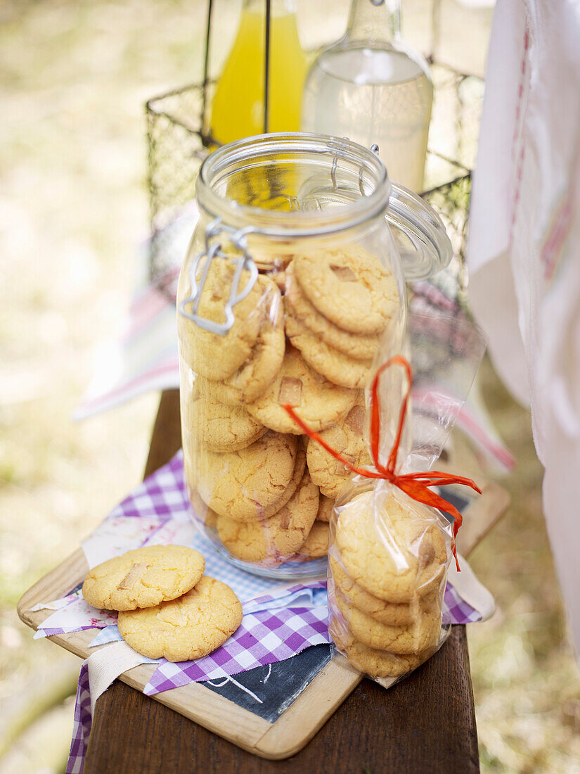 Cookies with custard and white chocolate in a glass for a picnic