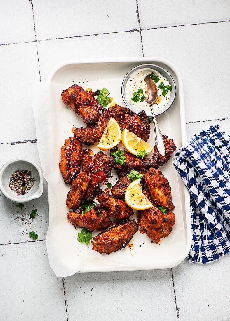 Chilli chicken wings with a sour cream dip