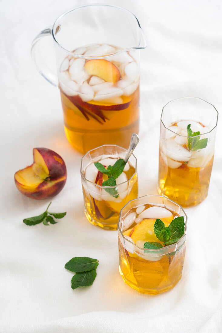 Homemade peach iced tea with mint