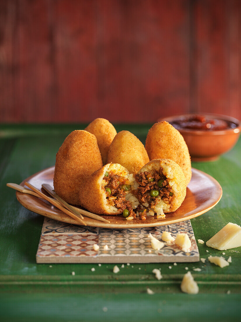 Arancini with minced meat and pea filling