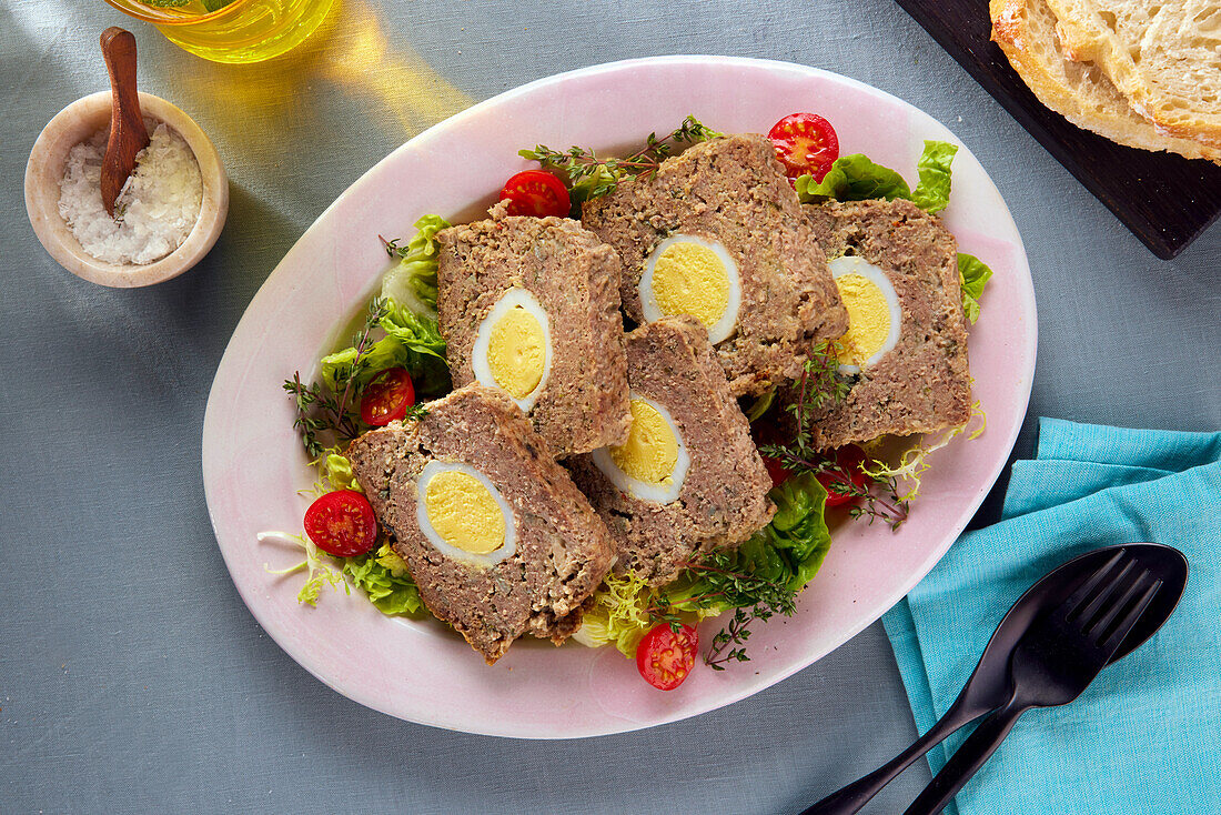 Meatloaf with egg (fake rabbit) on salad