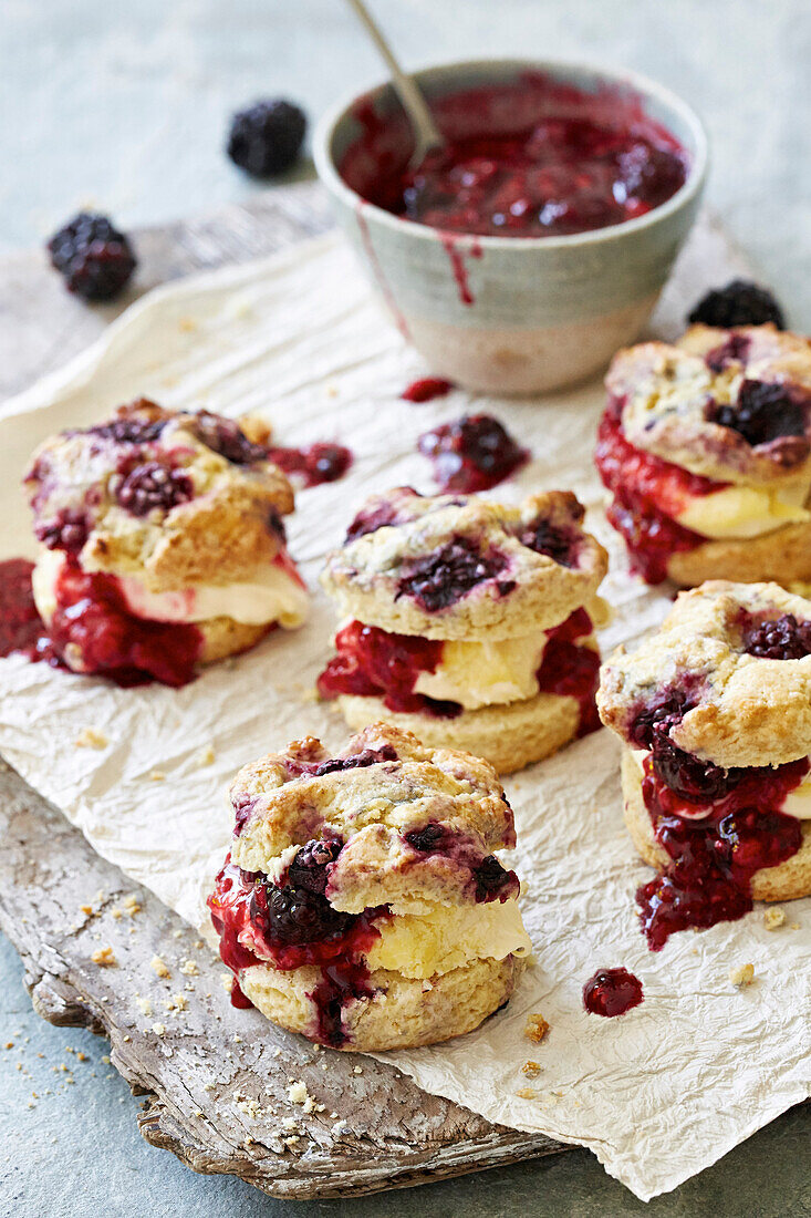 Blackberry scones with fruit compote and cream