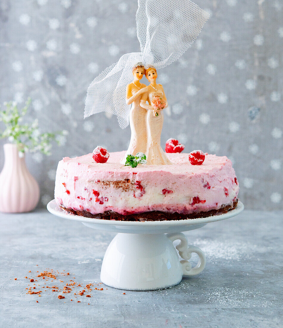Raspberry wedding cake for same-sex couple