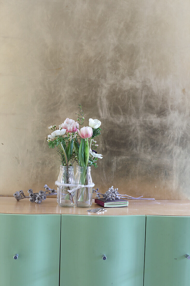 Posies of anemones, tulips and waxflowers