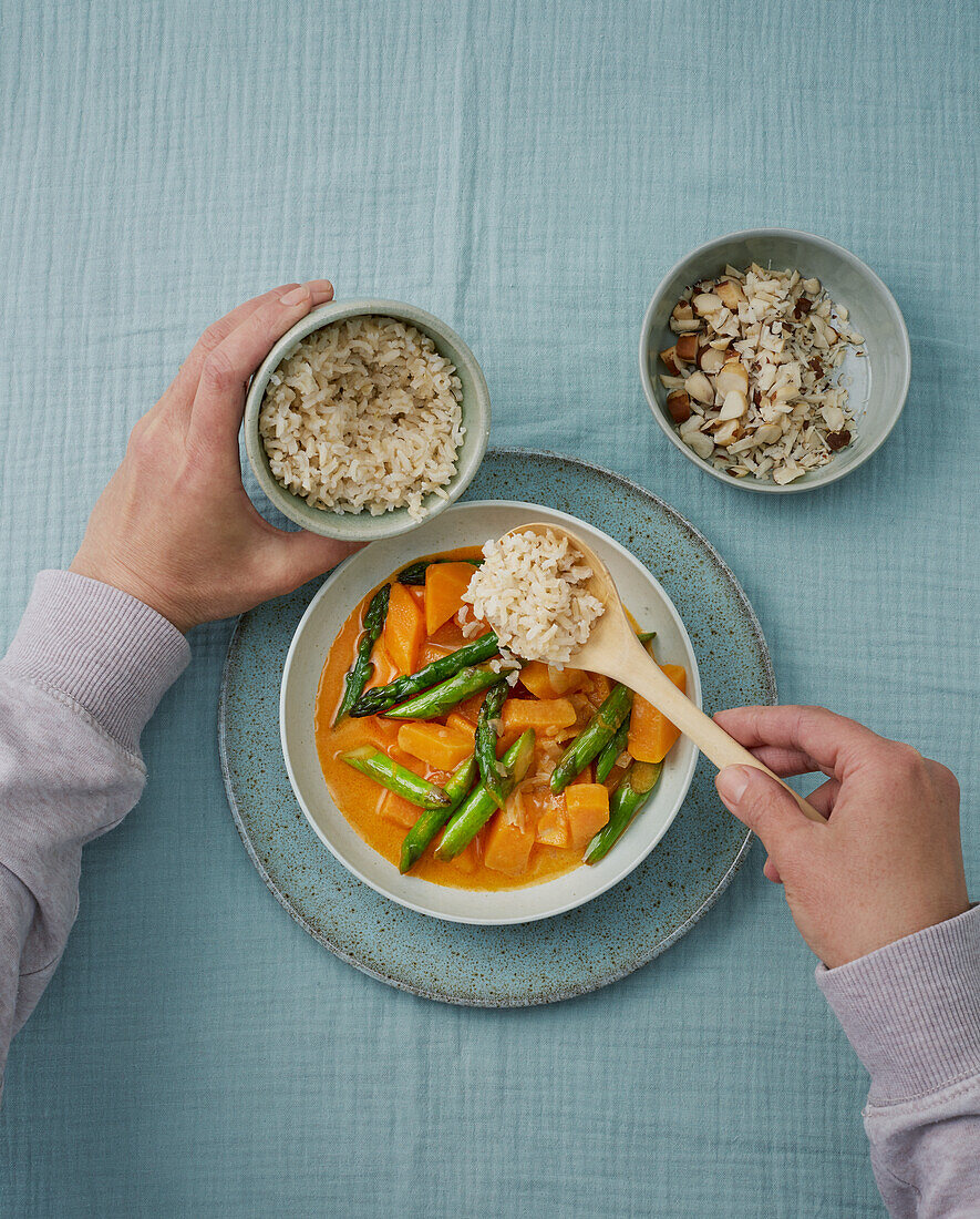 Vegan sweet potato and asparagus curry with rice