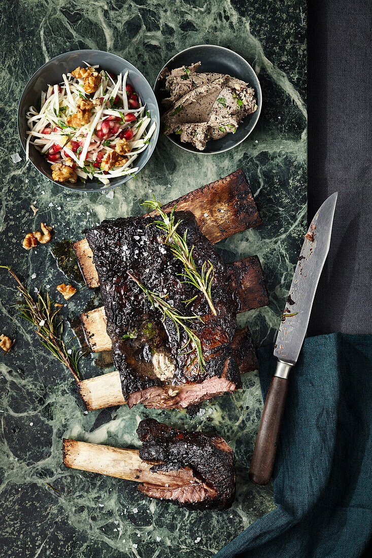 Sous-Vide short ribs in a herb rub with celery and pomegranate salad