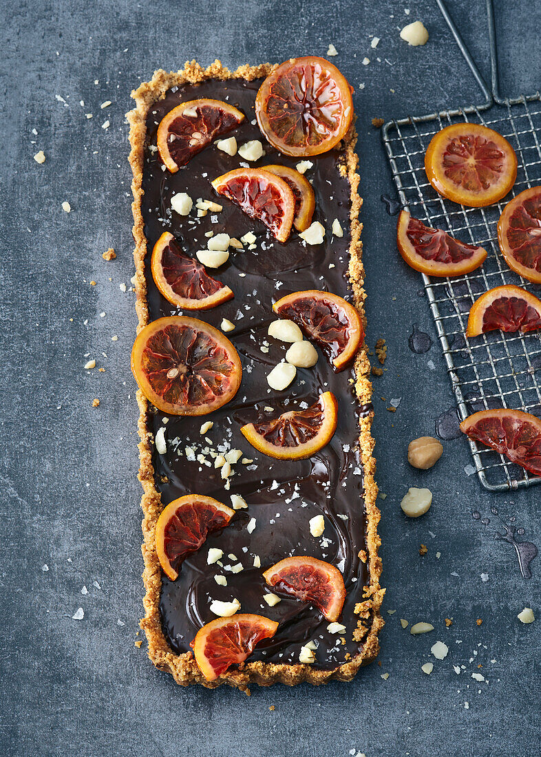 Salty chocolate tart with candied blood oranges