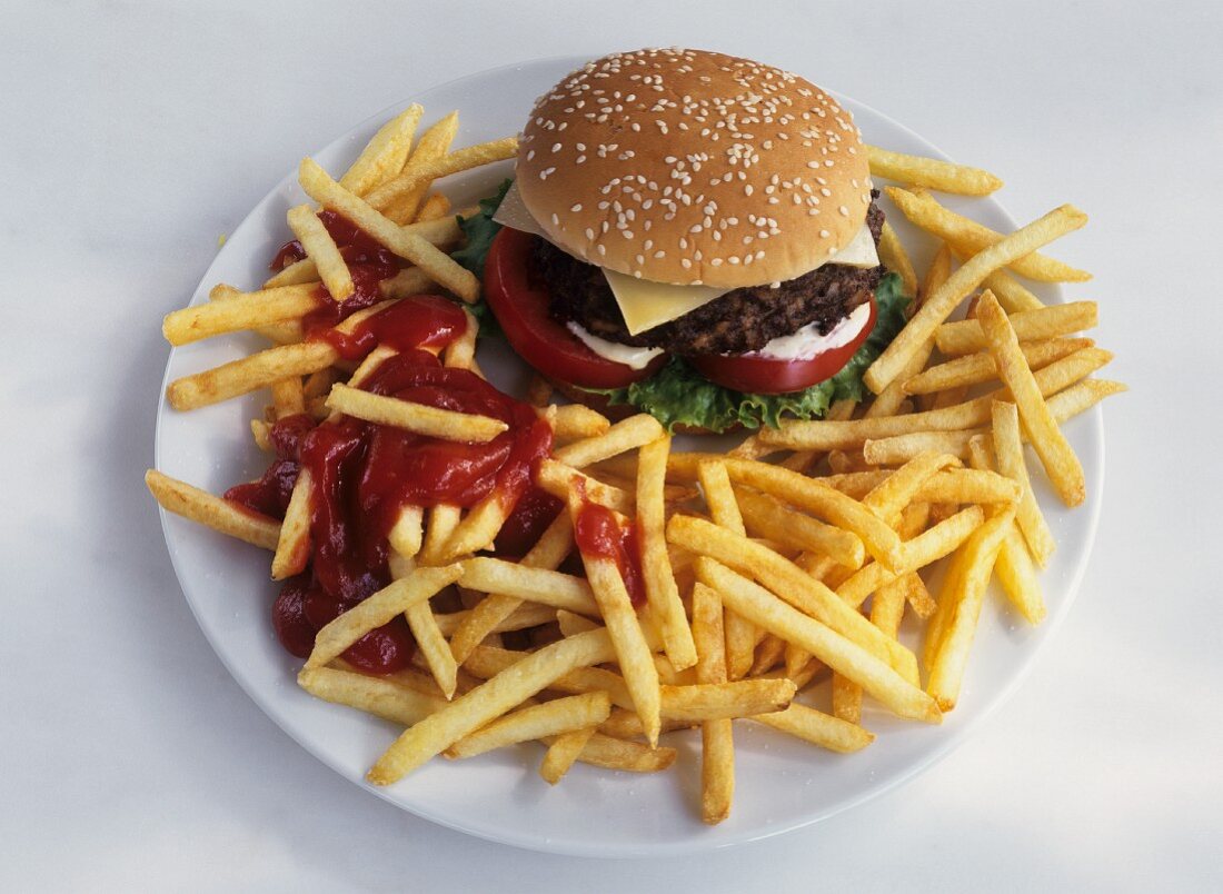 Cheeseburger with French Fries and Ketchup on Plate