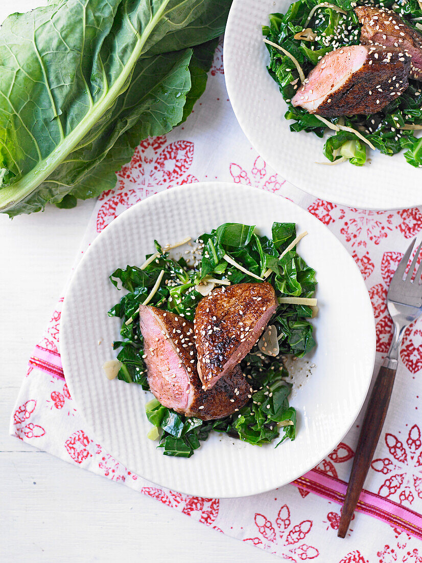 Duck breast with ginger sesame greens
