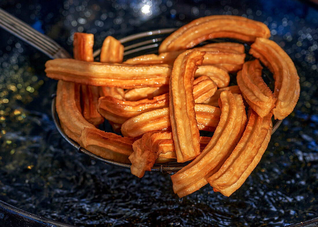 Churros on a strainer