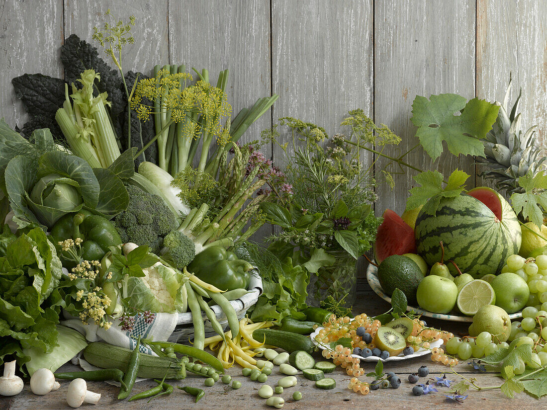 Still life with green vegetables and green fruit