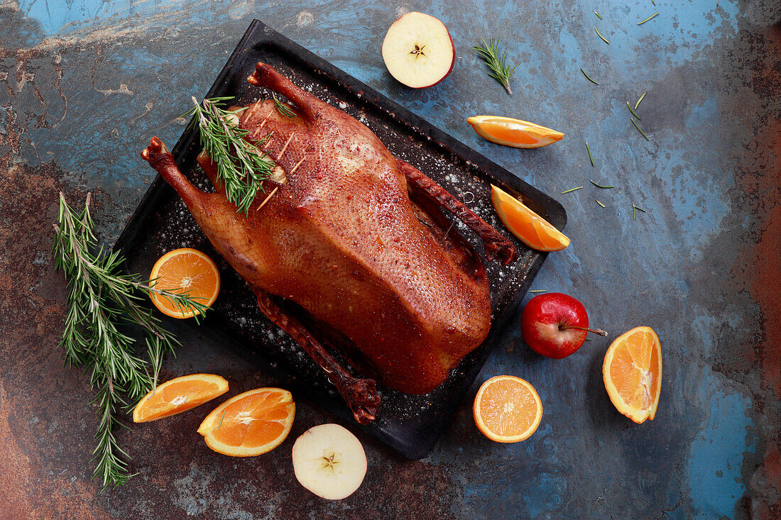 Baked goose stuffed with fruits