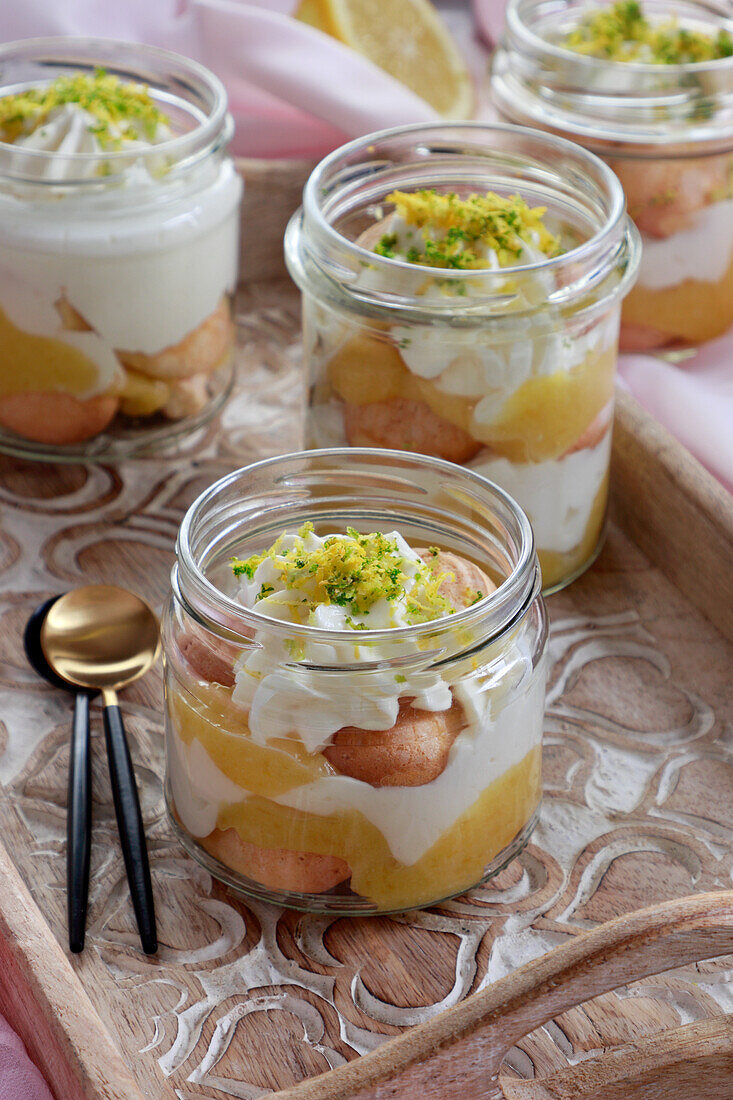 Lemon curd dessert tiramisu served in jar