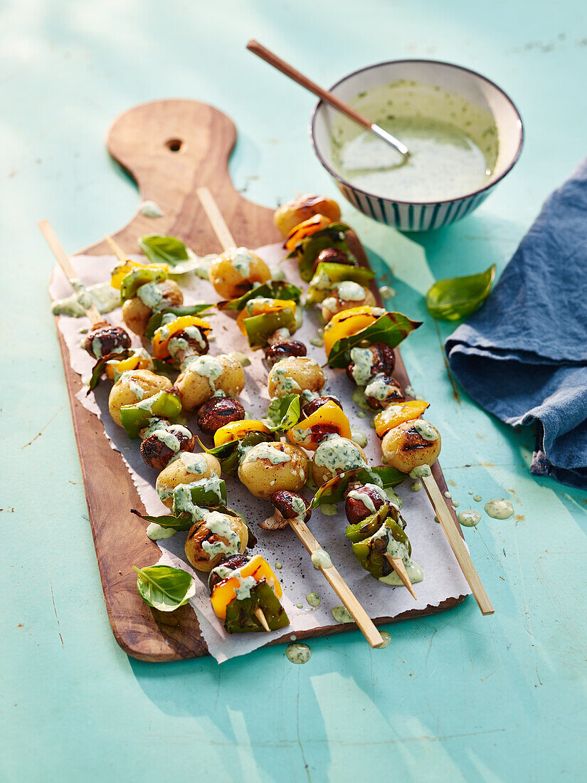 Vegetable skewers with creamy pesto dressing