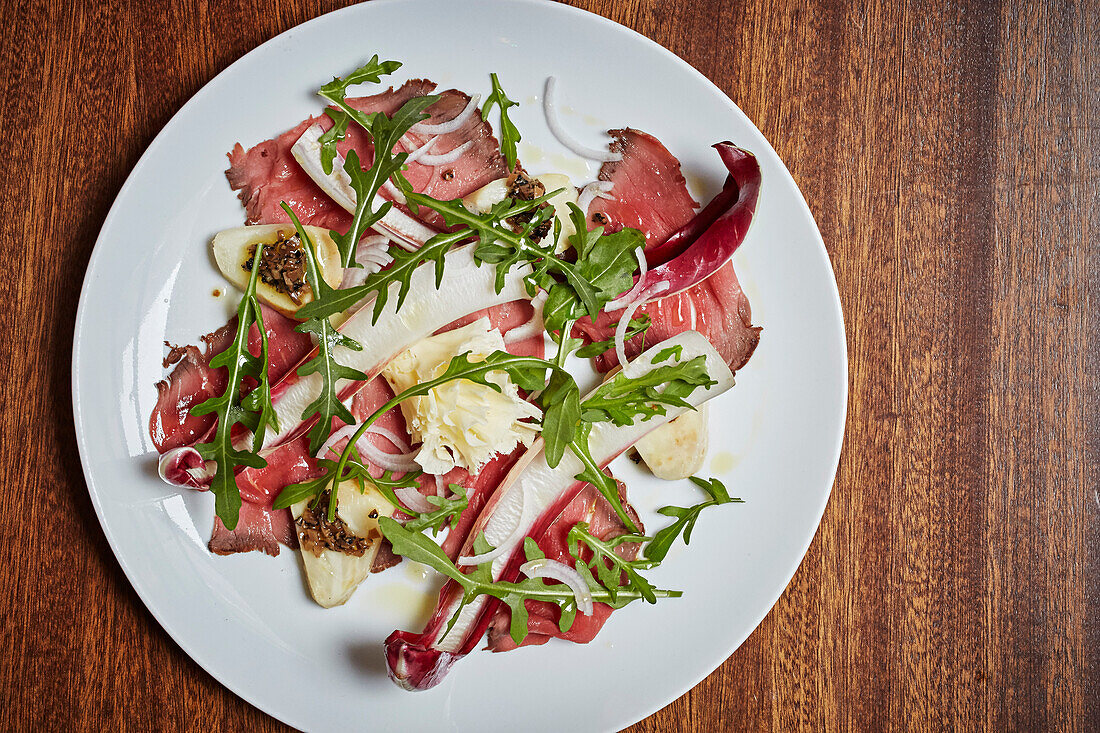 Beef bresaola with chickory and rocket