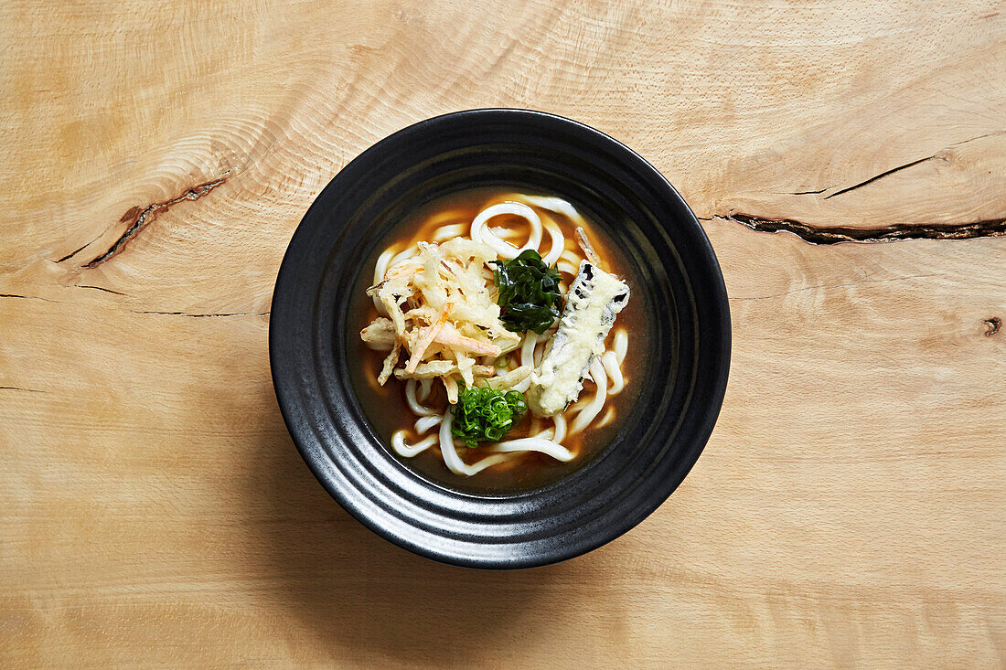 Ramen with udon noodles, seaweed, spring onions and aubergine tempura