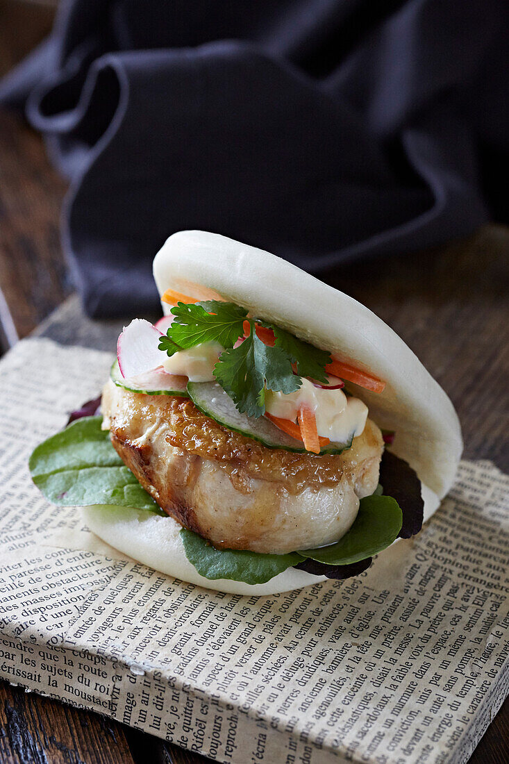 Bao filled with chicken and salad