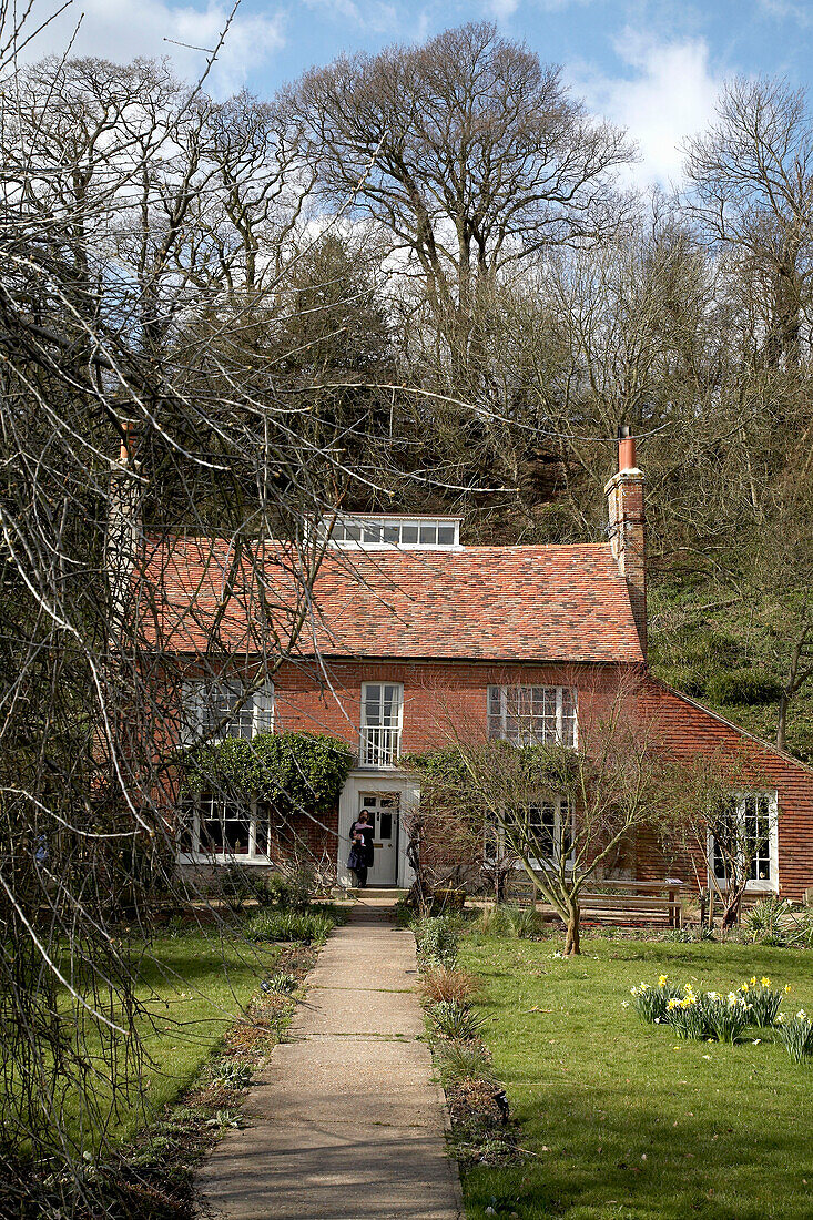 Footpath leading through garden to cottage exterior in Rye, Sussex