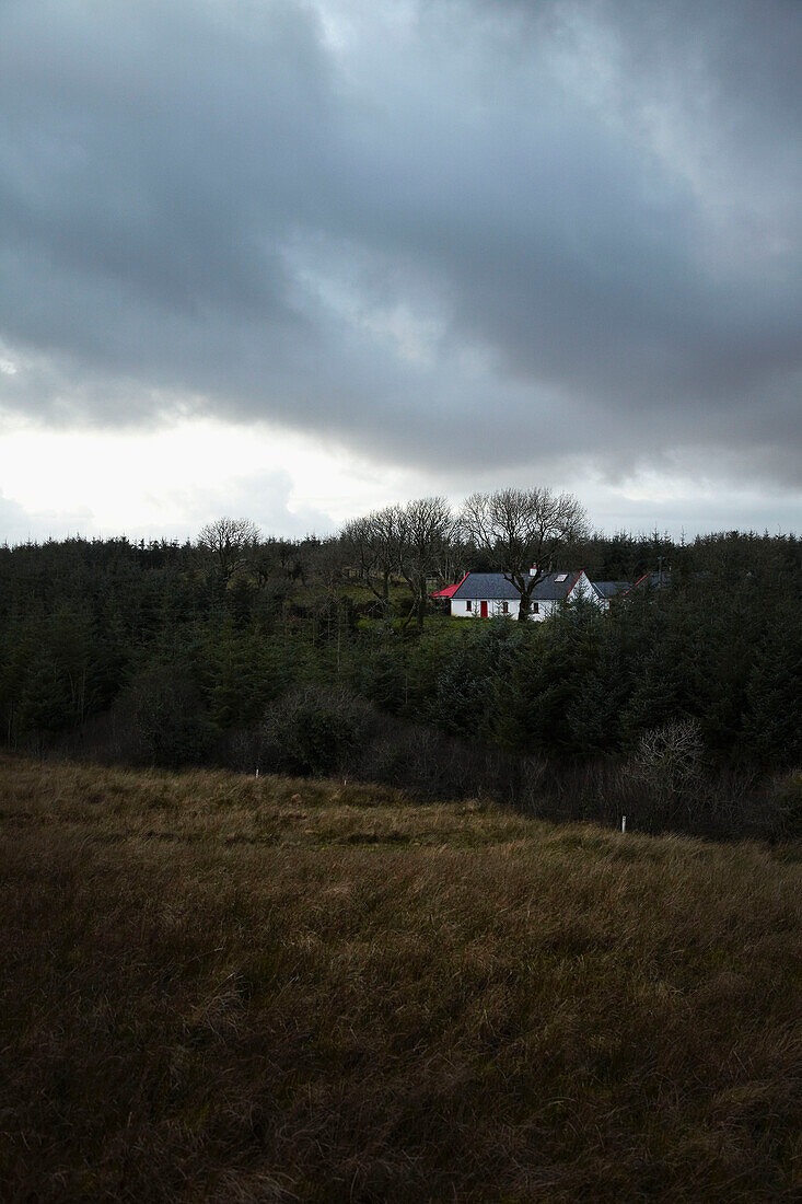 Cottage in winter landscape County Claire Ireland