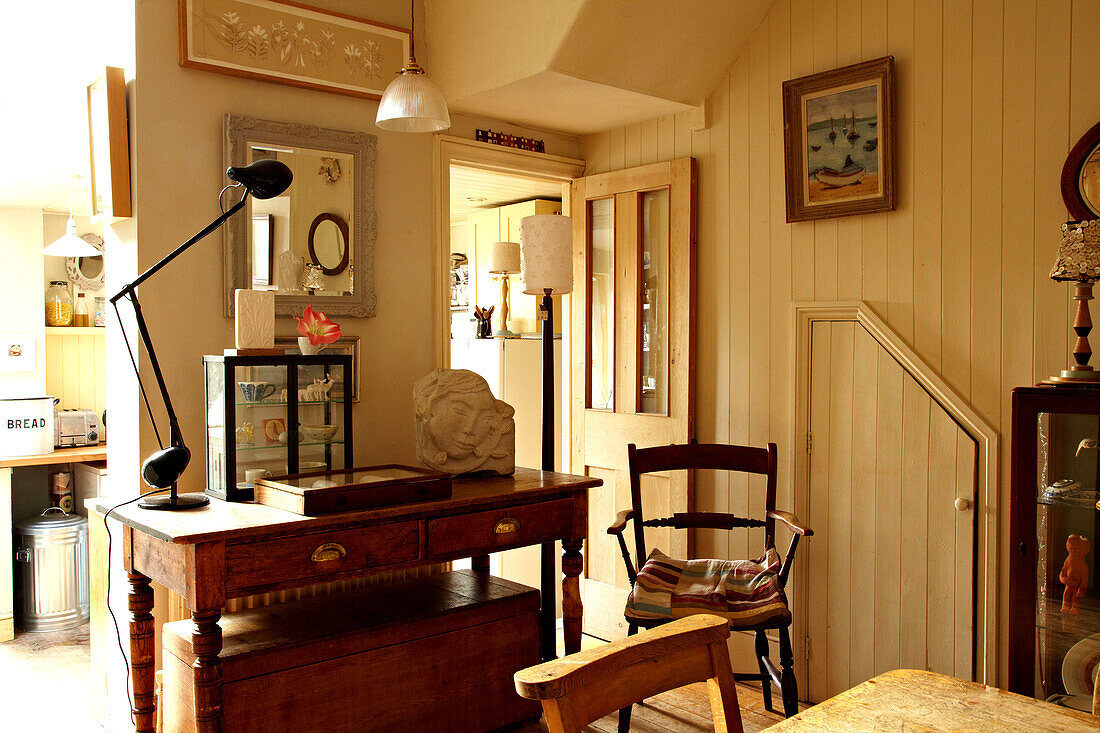 Desk lamp on wooden console table in Brighton home, UK