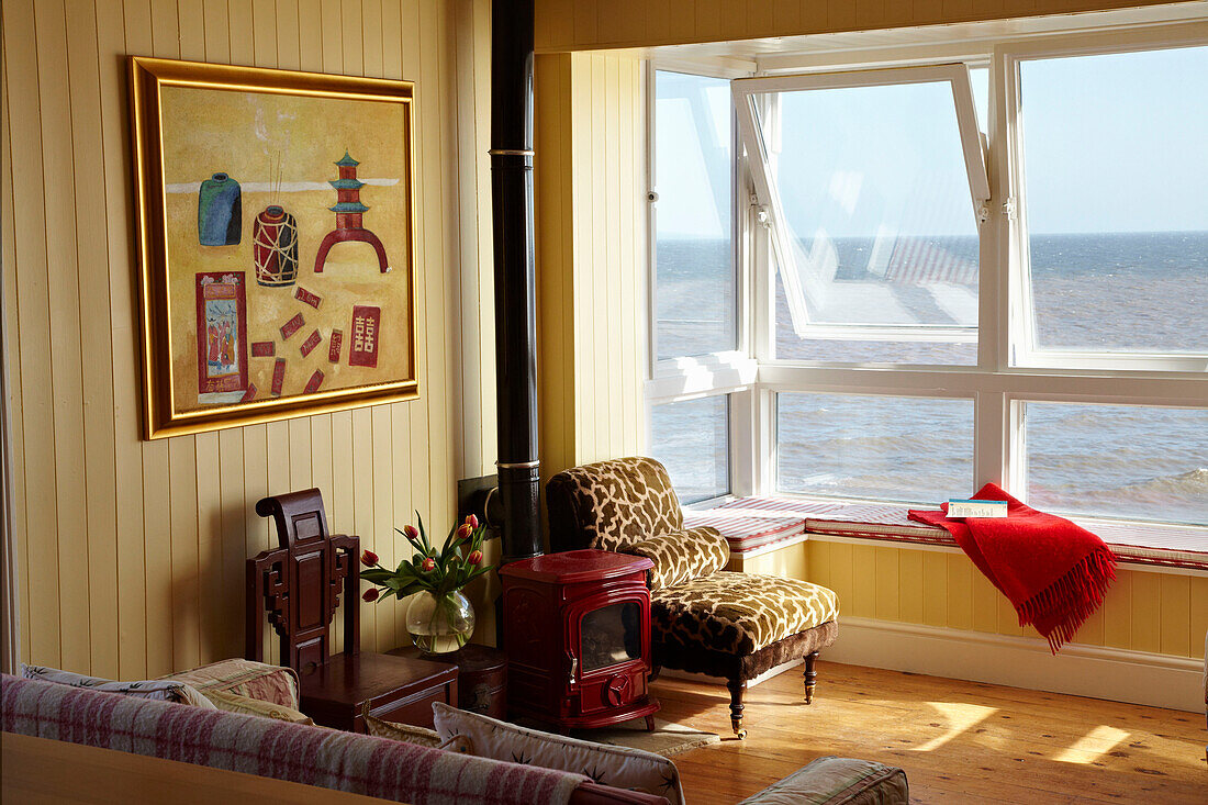 Window seat in beach house living room Cromer in Norfolk, England, UK