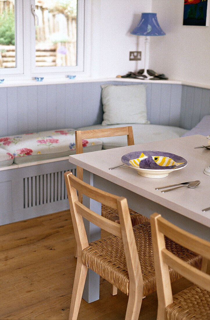 Dining table with wooden chairs