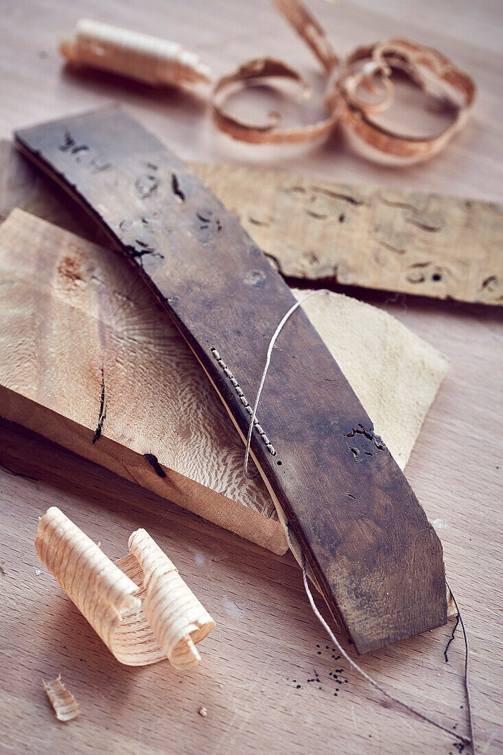 Wood samples and shavings in carpentry workshop Bridport, Dorset, UK