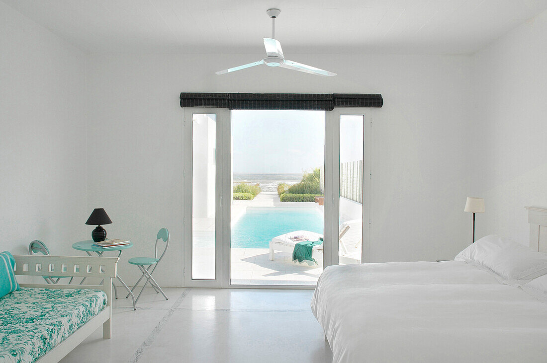 Guest room independent from main house all white with cement floor and marble finish