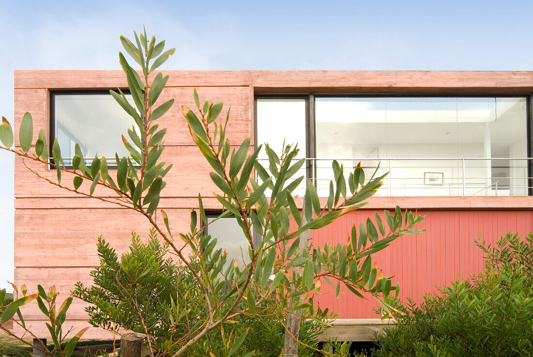 Coastal house exterior painted pink