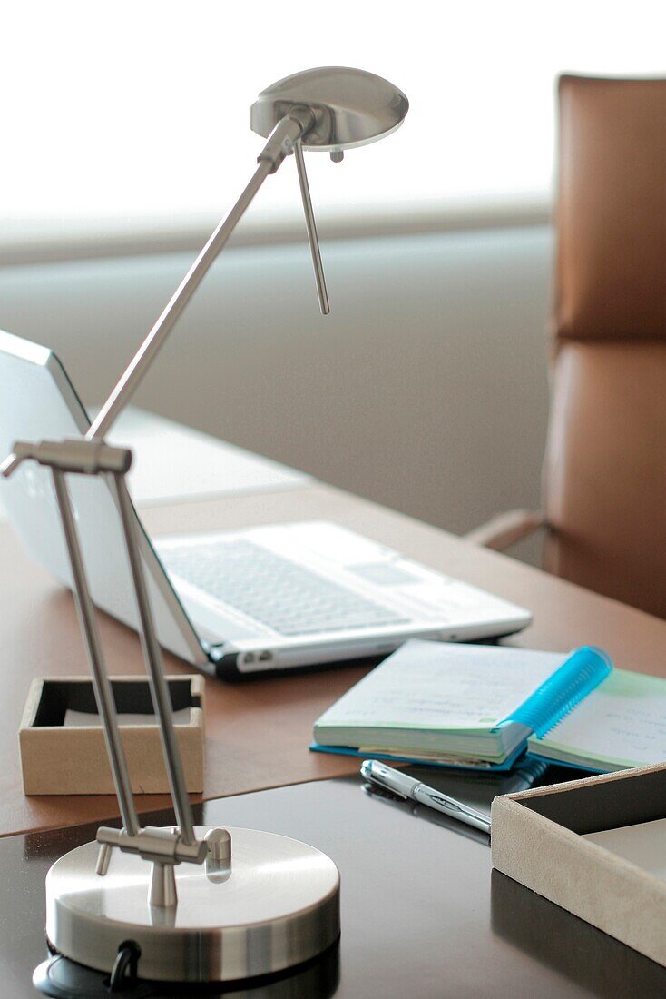 Close-up of angle-poise lamp on desk, Buenos Aires, Argentina