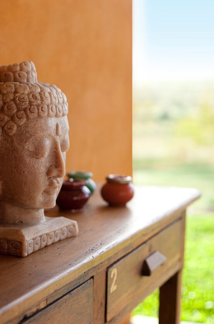 Uruguay, Buddha bust on table