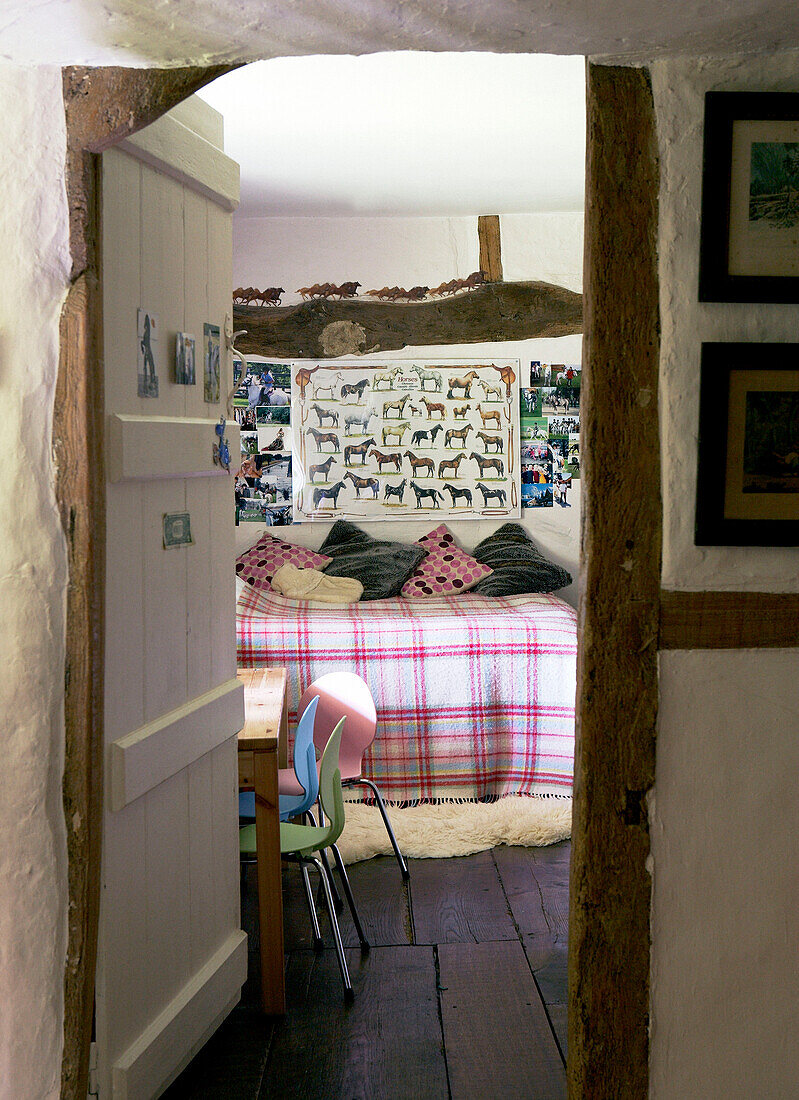 View through doorframe to child's bedroom in 17th Century Oxfordshire home