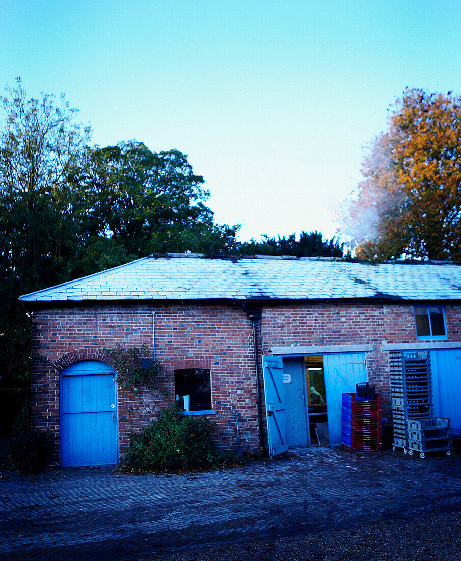 Brick exterior and driveway with crates