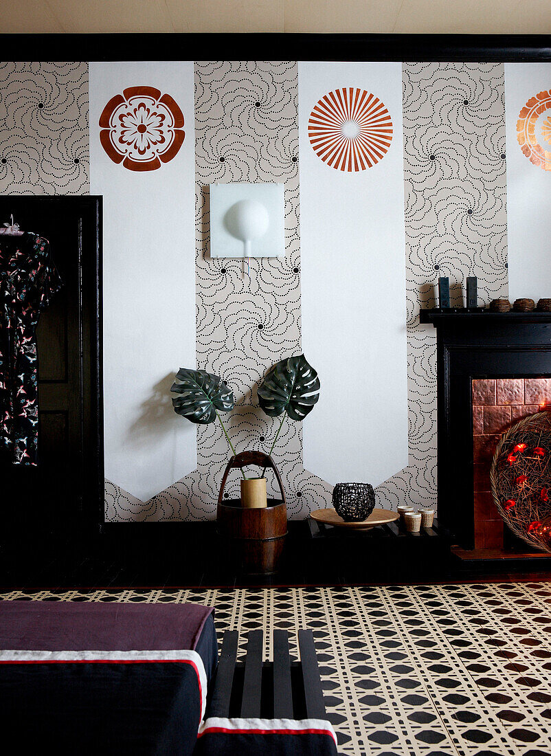 Wall motifs and ornate tiled floor of Georgian farmhouse bedroom