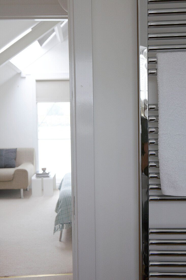 Heated radiator in ensuite bathroom of sustainable housing development in Gloucestershire