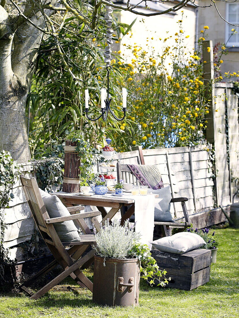 Breakfast table in garden City of Bath Somerset, England, UK