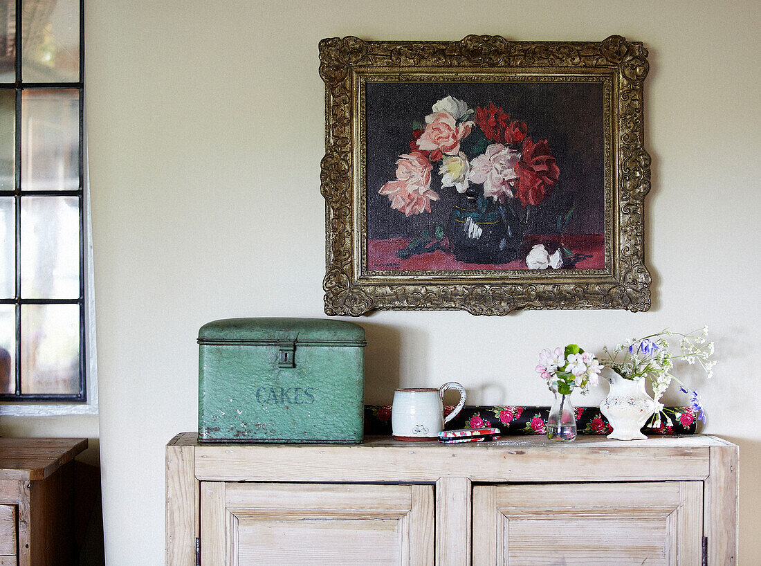 Cake tin on sideboard in Oxfordshire kitchen, England, UK