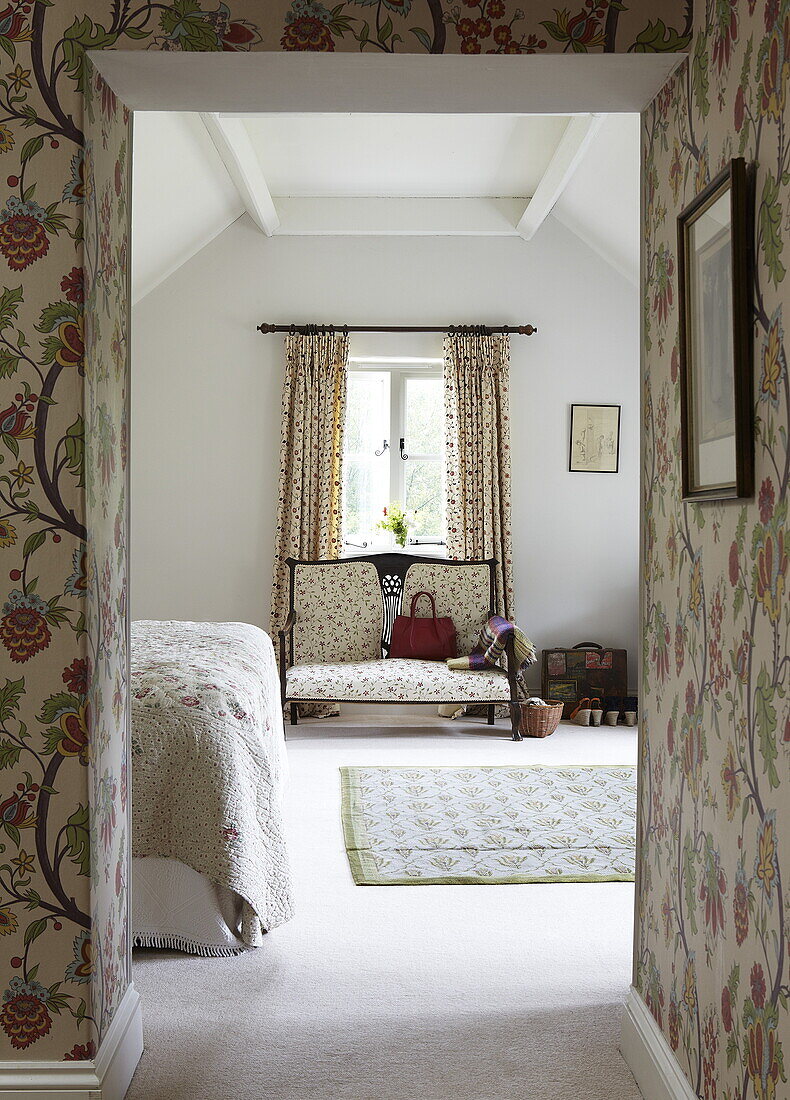 View through hallway to bedroom in Oxfordshire home, England, UK